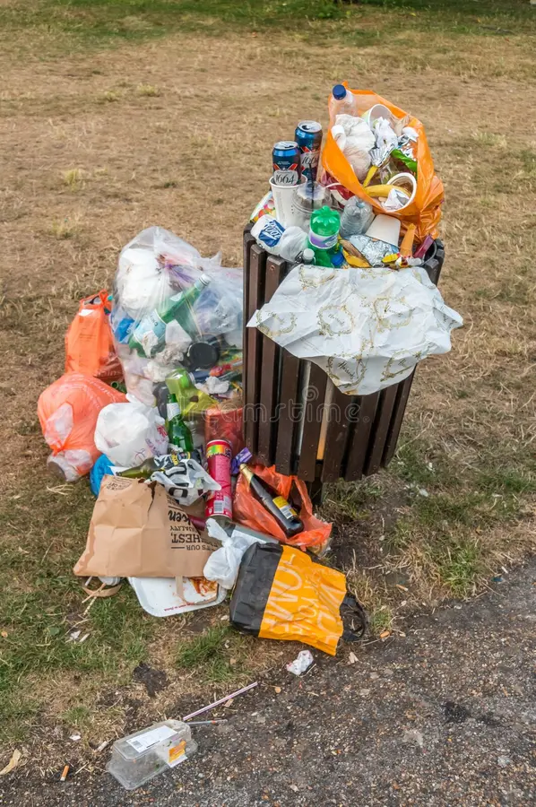 pollution concept overflowing trash bin park rd august london united kingdom 72743051